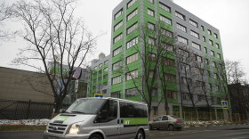 A car of Russian state-owned television station RT passes by the company's office in Moscow, Russia, Friday, Oct. 27, 2017. Twitter said on Thursday it would ban ads from RT and Sputnik, two state-sponsored Russian news outlets that the U.S. intelligence community has said tried to interfere with the 2016 U.S. presidential election. (Pavel Golovkin/AP)