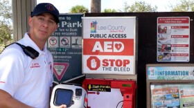 Lee County EMS Lieutenant Cory Witte displays the new public AED cabinets now installed at several Lee County parks. These cabinets are part of Lee County’s ongoing efforts to make lifesaving equipment accessible when every second counts. Knowing how to use them can help save a life before first responders arrive.