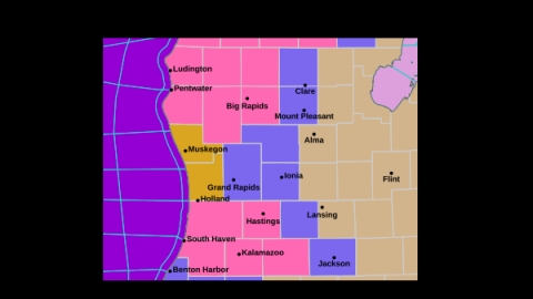 An image from the National Weather Service showing winter storm warnings (in pink), winter weather advisories (blue), high wind warnings (goldenrod), wind advisories (tan) and a storm warning for Lake Michigan (purple) on Wednesday, November 26, 2025