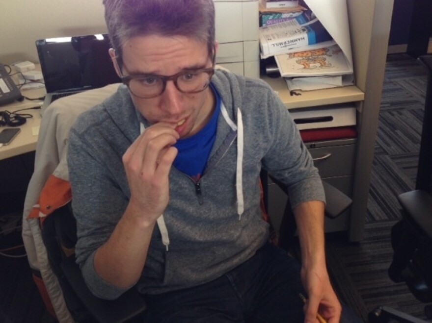 The happiest photo we have of Intern Steven eating a Pecan Pie Pringle.
