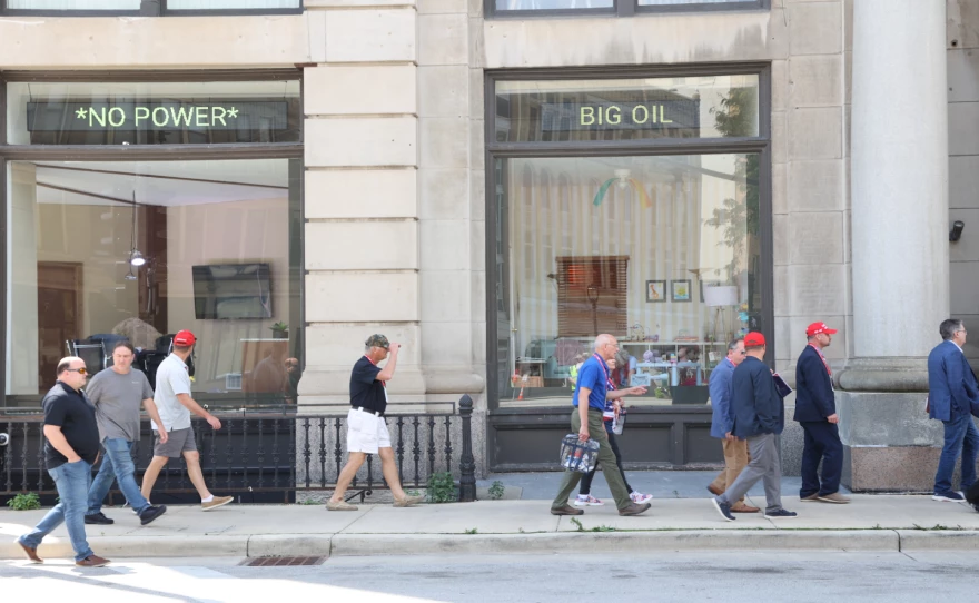 Storefront windows near the Republican National Convention in Milwaukee highlight