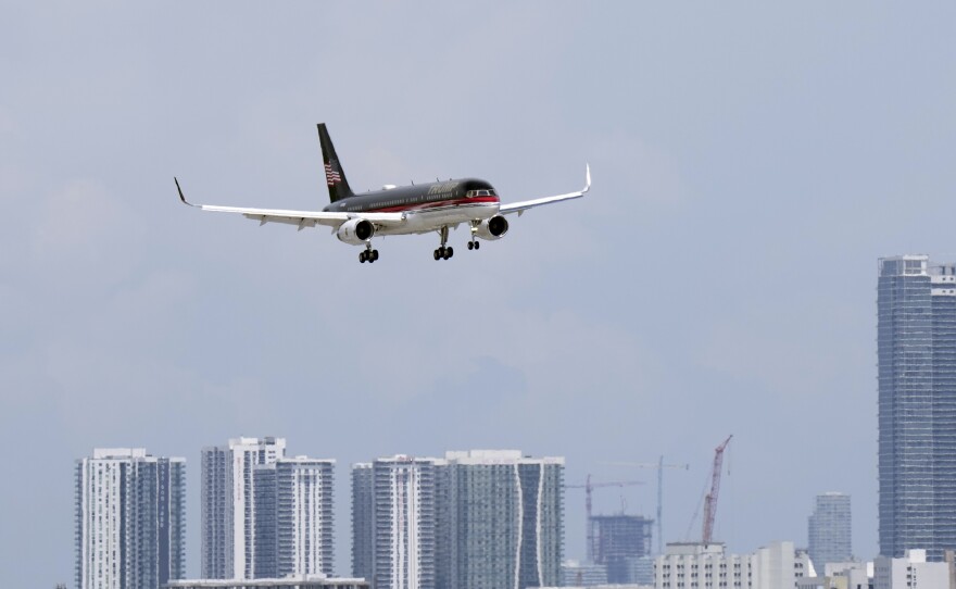 Trump's personal plane approaches Miami International Airport on Monday.