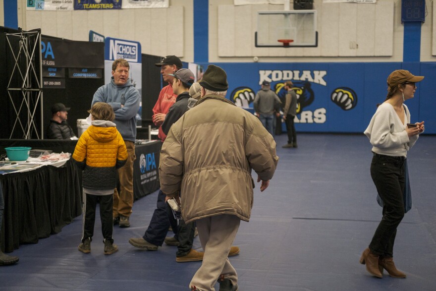 Attendees exploring booths on the floor of ComFish. March 16, 2023. Brian Venua/KMXT