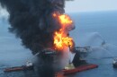 Rescue boats attempt to put out the blaze from the Deepwater Horizon oil rig after it exploded on April 20, 2010. The disaster became the worst marine oil spill in American history. (Photo courtesy of NOAA)