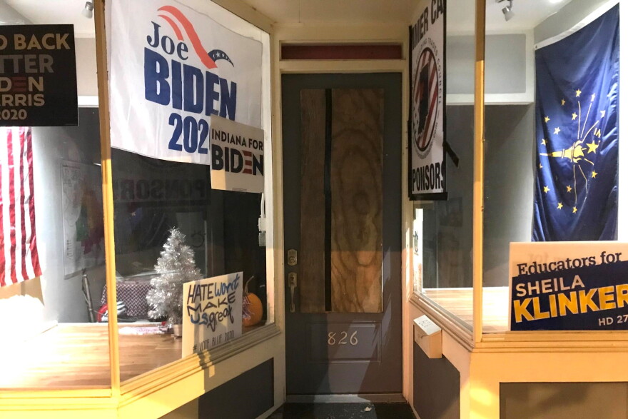 The door to the Tippecanoe County Democrats' HQ boarded up after shots were fired into the building Jan 7, 2020.