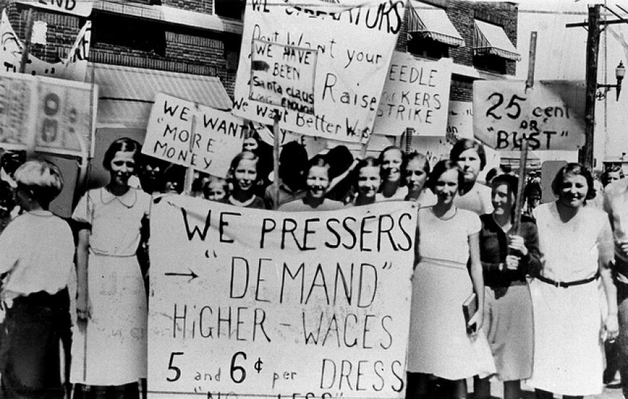 Women pressers on strike for higher wages.