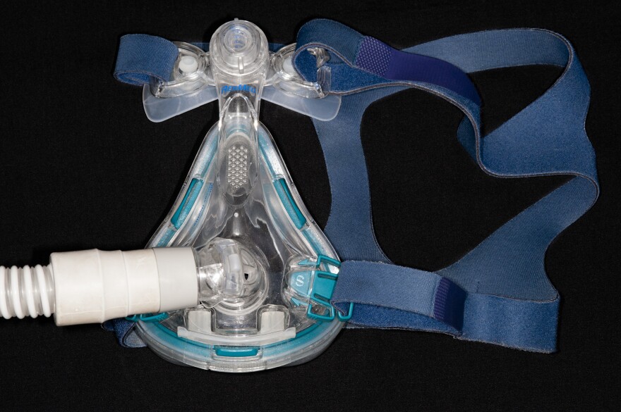 The mouthpiece of a CPAP (continuous positive airway pressure) device delivers enough pressurized air to keep the breathing passage of someone who has obstructive sleep apnea open throughout the night.