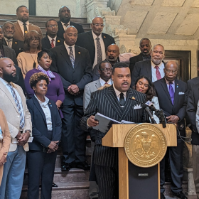 Representative Daryl Porter, Jr., (first row, second from the left) joins other Democratic state lawmakers addressing the press toward the end of the 2026 session.