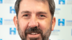 Dr. Justin Robertson