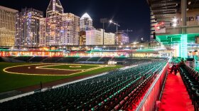 Charlotte Christmas Village partnered with the Charlotte Knights this year for an event that includes a "Light the Knights" showcase of Christmas lights.
