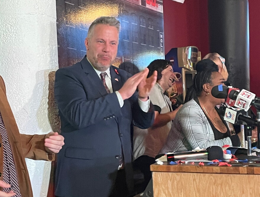 Eric Sorensen addresses supporters early Wednesday in the Quad Cities. Sorensen is a former TV meteorologist vying to be Illinois’ first LGBTQ member of Congress.