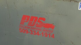Logo of Pullman Disposal Service on a trash can.