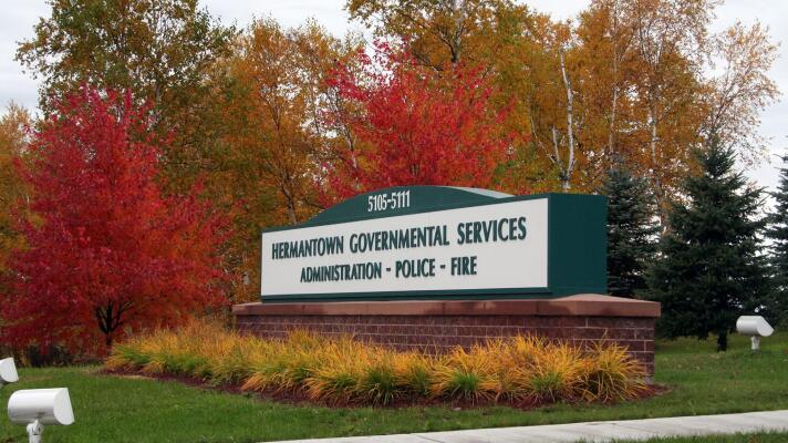 A sign marks the location of Hermantown Governmental Services.