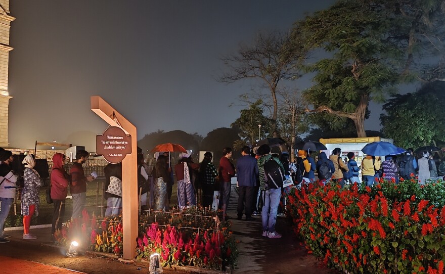 A queue on a rainy evening for author autographs and books at the Kolkata Literary Meet.