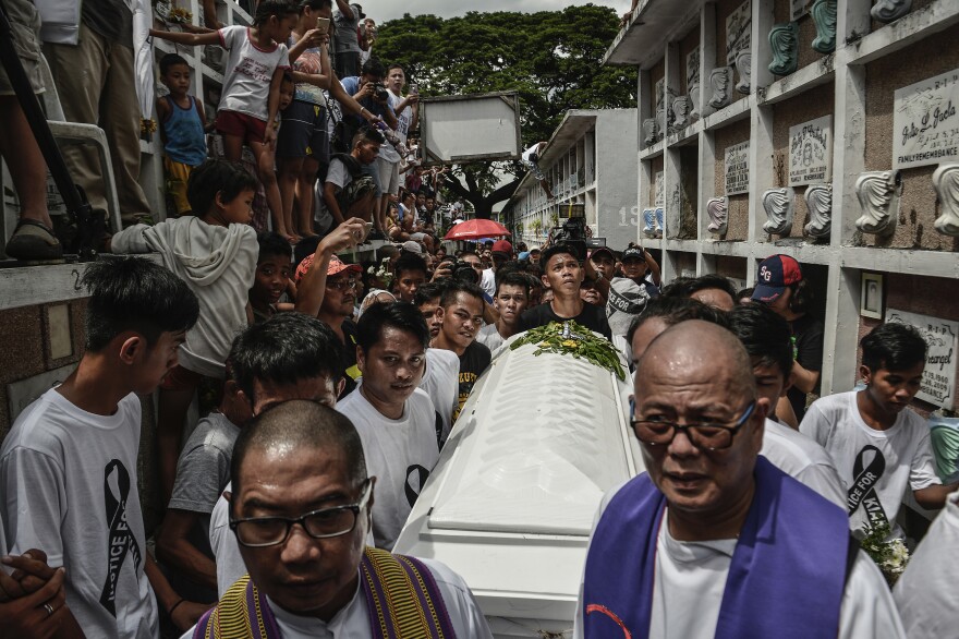 The funeral of 17-year-old Kian Loyd Delos Santos in Caloocan on Aug. 26, 2017. Police say Delos Santos fought back during an anti-drug operation, but witnesses and security footage saw plainclothes police dragged Delos Santos to a dark lot where he was killed. Thousands marched at the funeral, condemning the thousands of extrajudicial killings under President Rodrigo Duterte's war on drugs.