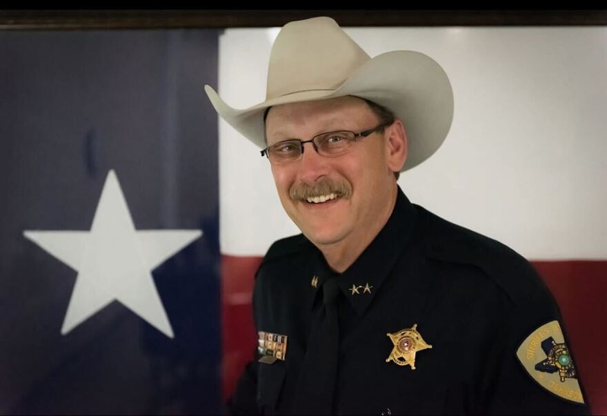 Johnson County Sheriff Adam King was arrested in August on sexual harassment and retaliation against a witness charges.