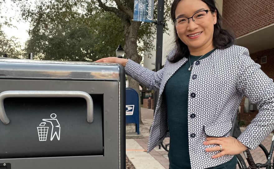 Chief Climate Officer Dan Zhu takes pride in the solar-powered trash cans placed throughout downtown Gainesville. The trash cans are part of Gainesville’s commitment to Zero Waste by 2040.