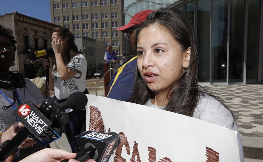 Brenda Ramirez, 18, speaks to reporters about the opportunities she receives via the DACA program during a protest earlier this month in downtown Jackson, Miss.