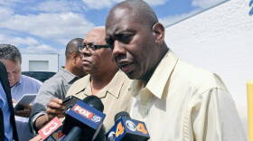 Rev. Charles Harrison, right, speaking after a community meeting with Indianapolis police command.