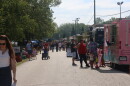 On Saturday, Sept. 12, festival participants walk along South Park Street of the Marci Jane Lewis Park, where the festival's vendors and food trucks are located. Since it was the last day of the festival, this area stayed open from 11:30 a.m. to 10 p.m.