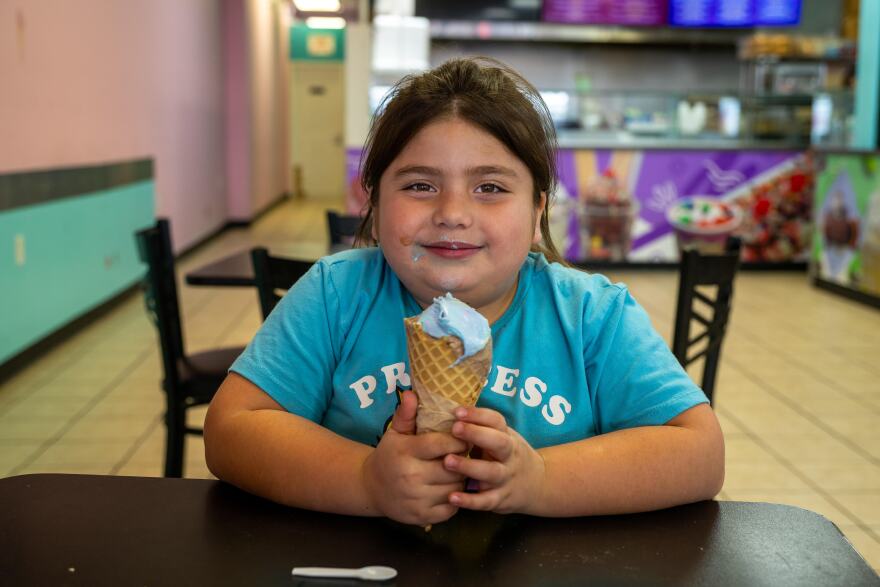 Yazmine Guerrero, 7, of St. Joseph, Missouri, enjoyed a bubblegum ice cream waffle cone recently at Frutopia, located at 3737 Independence Avenue in Kansas City, Missouri. Frutopia is a Mexican paleteria, ice cream shop, and grill.