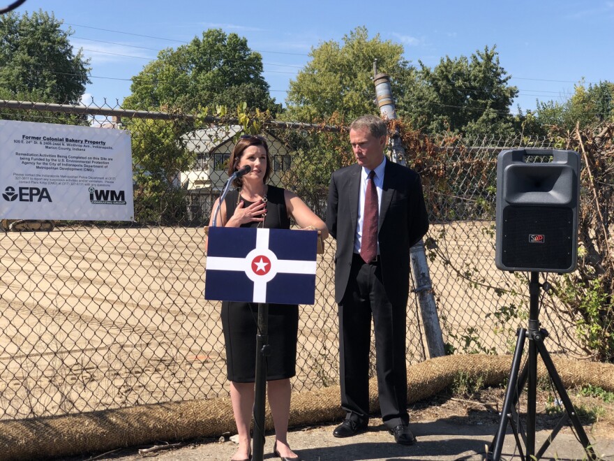 Department of Metropolitan Development Director Emily Mack and Mayor Joe Hogsett announce a $345,000 grant for environmental remediation at the former Colonial Bakery site.