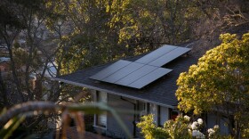 Rooftop solar panels on a home in the Rockridge neighborhood of Oakland, on Feb. 18, 2020.