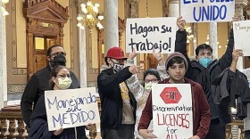 Members of immigrant rights activist group Movimiento Cosecha demonstrated at the Statehouse on Wednesday.