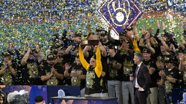 Milwaukee Brewers catcher William Contreras holds the MVP trophy after they won baseball's World Series against the Tampa Bay Rays, Wednesday, Oct. 28, 2026, in St. Petersburg, Fla.