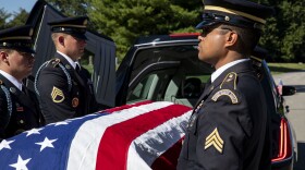 Soldiers of the Indiana National Guard ceremonial unit remove a casket from the back of a hearse as they refine their gravesite honor duties at Crown Hill Cemetery in Indianapolis, Wednesday, Sept. 3, 2025.