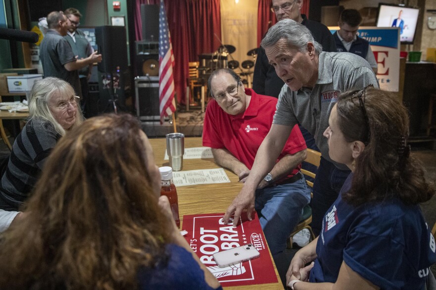 Rep. Jody Hice, R-Ga., speaks with supporters during a campaign event at the Flying Machine restaurant in Lawrenceville, Ga. Hice, one of the nation's preeminent election deniers, is running for Georgia secretary of state.