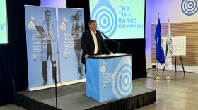 Tiny Cargo Company CEO Alan Gourdie speaks at the opening of the company's Roanoke facility.
