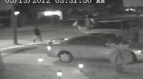 A still photo taken from the security camera that captured the attack.