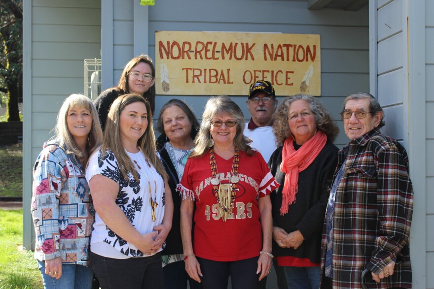 The Nor Rel Muk Wintu Tribal Council gathers in front of the Nor Rel Muk Nation Tribal Office. Cindy Foster-Olstad wears a patterned blue shirt in the back row. Her grandmother may have lived on the land given back to the tribe. Photo taken on Feb. 3, 2024 in Big Bar, Calif.