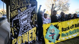 Protesters voice their opposition to the proposed sale of TXNM Energy Inc., the parent company of Public Service Company of New Mexico, to Blackstone before Thursday's New Mexico Public Regulation Commission public hearing.