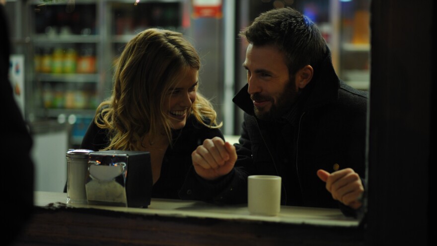 Alice Eve and Chris Evans play two strangers who happen upon each other at Grand Central Station in <em>Before We Go</em>.