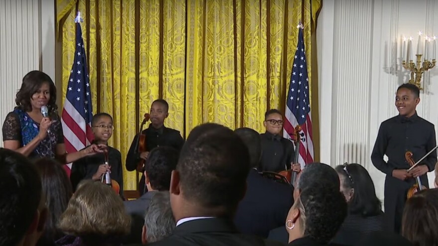 Michelle Obama with Perfect Fourth String Quartet photo