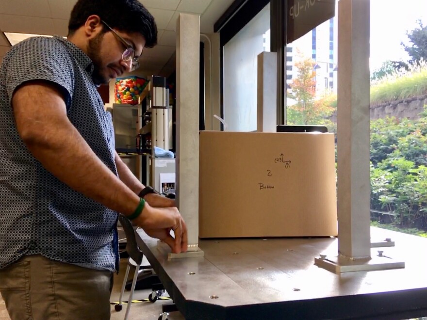 Designers at BillerudKorsnäs use a shaking machine to mimic the bumps on a delivery truck. It's one of several tests that tell them whether their paper packaging is strong enough to replace plastic.