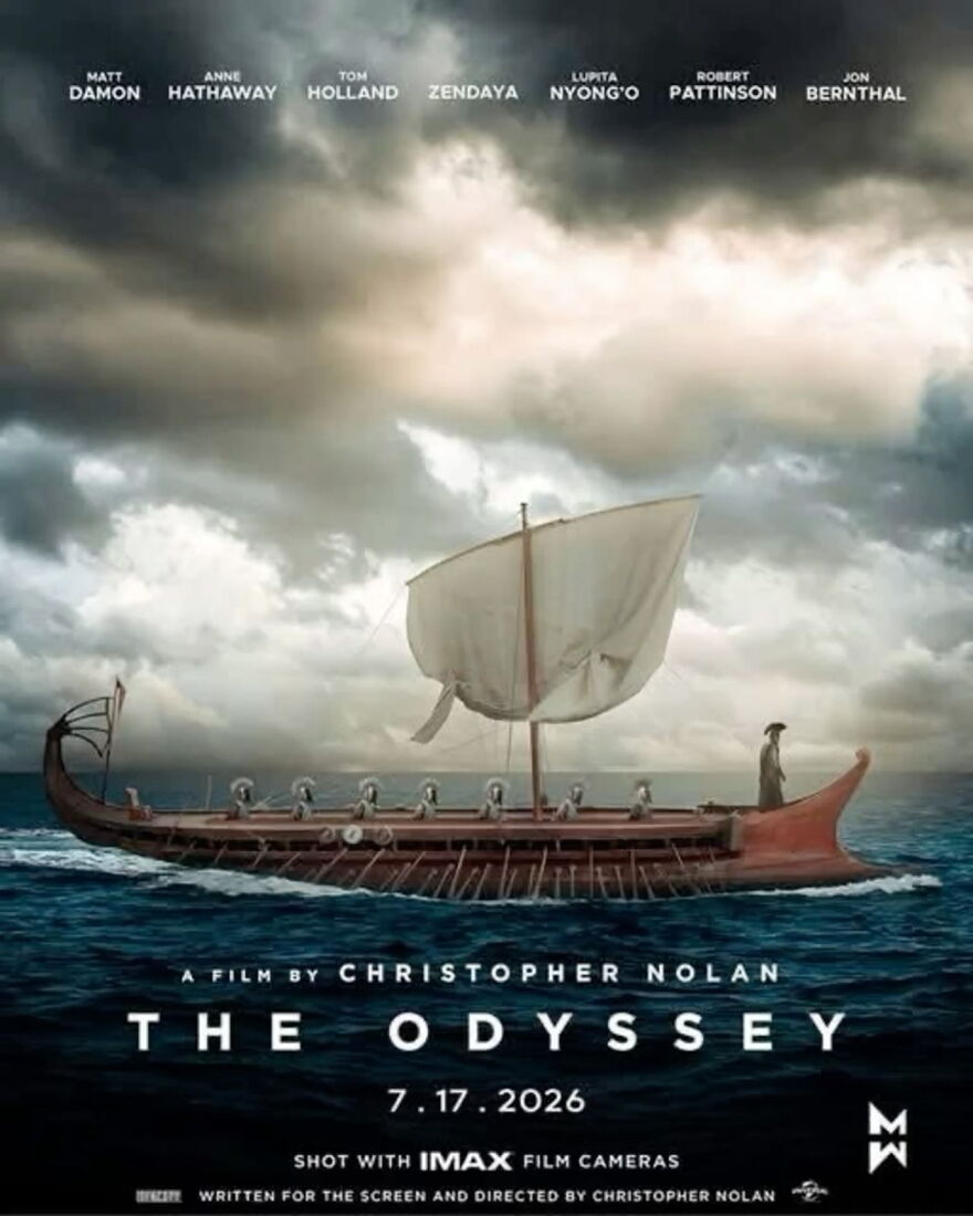 Movie poster for Christopher Nolan's The Odyssey. It features a Greek-style longboat in the ocean with Greek soldiers pulling oars and Odysseus at the helm. Some of the main actors are listed at the top of the poster and at the bottom it has the release date, July 17 2026.