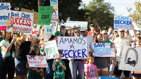 Noel, 6, a Bryker Woods Elementary School student, chants during a protest at the Austin Independent School District building. 