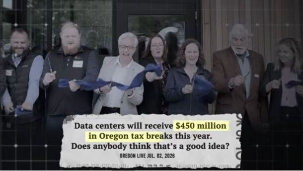 screenshot of tv ad with people at ribbon cutting with text over screen