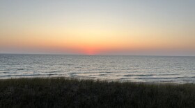 The sun sets over Lake Michigan in October 2023. (Photo: Izzy Ross/IPR News Radio)