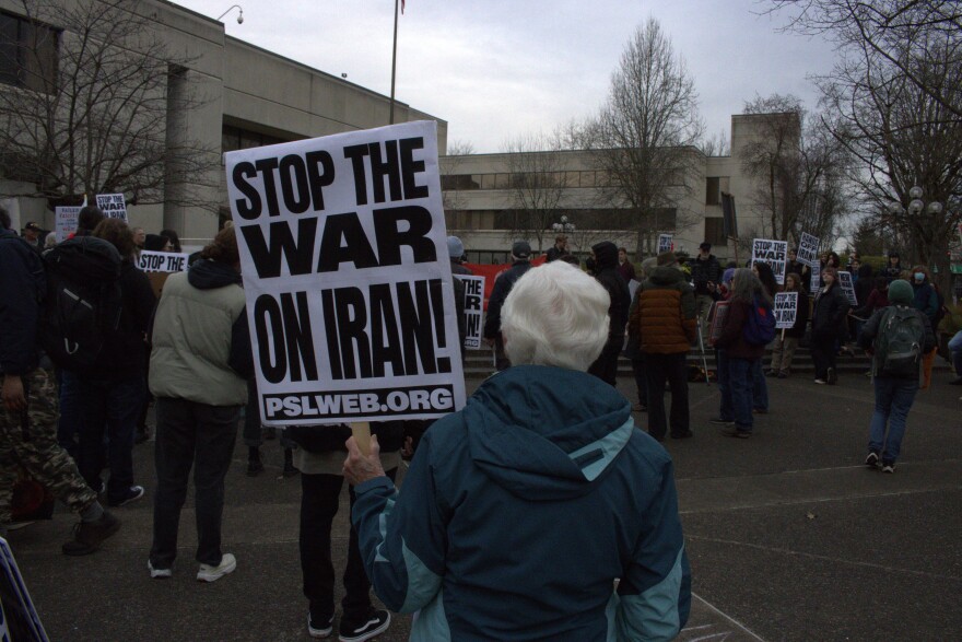 Protesters gather outside the Eugene Federal Building to denounce American and Israeli attacks on Iran on Feb. 28, 2026.