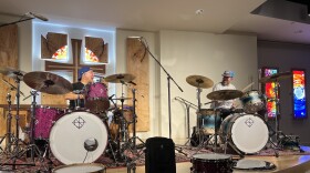 Gregg Bissonette (left) plays drums with Hometown Music co-owner Chris Jackson during a workshop at Arts Incarnate in downtown Harrisonburg.