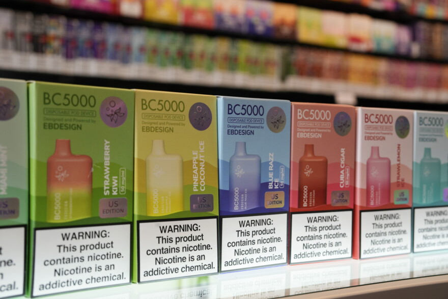FILE - Varieties of disposable flavored electronic cigarette devices manufactured by EB Design, formerly known as Elf Bar, are displayed at a store in Pinecrest, Fla., Monday, June 26, 2023. (AP Photo/Rebecca Blackwell, File)