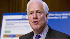 Sen. John Cornyn, R-Texas, the Senate minority whip, questions Health and Human Services Secretary Kathleen Sebelius before the Senate Finance Committee on Nov. 6.