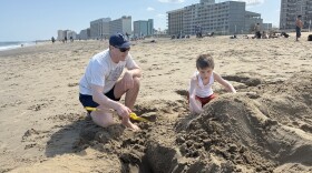 Nathan Ruffner and his son Luke build a sandcastle in Virginia Beach near the pier Apr. 2, 2026.