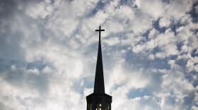 The sun rises behind the steeple of Maranatha Baptist Church Sunday, Aug. 23, 2015, in Plains, Ga. The Baptist church where former President Jimmy Carter teaches Sunday School classes and he and wife Rosalynn are deacons has been at the heart of their life since they returned to Georgia in 1981. On Sunday morning, Carter will teach his first lesson since detailing the intravenous drug doses and radiation treatment planned to treat melanoma found in his brain after surgery to remove a tumor from his liver. (AP Photo/David Goldman)