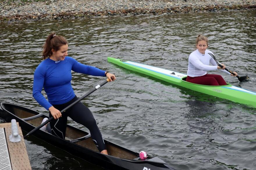 Sprint canoeist Nevin Harrison, left, and kayak racer Anna McGrory head out for a workout in Seattle on May 21, 2021. CREDIT: Tom Banse/N3