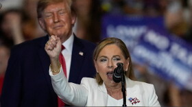 Sen. Darline Graham, R-S.C., speaks as President Donald Trump looks on at a campaign rally at the T. Ed Garrison Livestock Arena and Expo Center, Wednesday, Oct. 21, 2026, in Pendleton, S.C. (AP Photo/Mike Stewart)